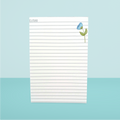 Notepad with a blue flower design on a light blue background