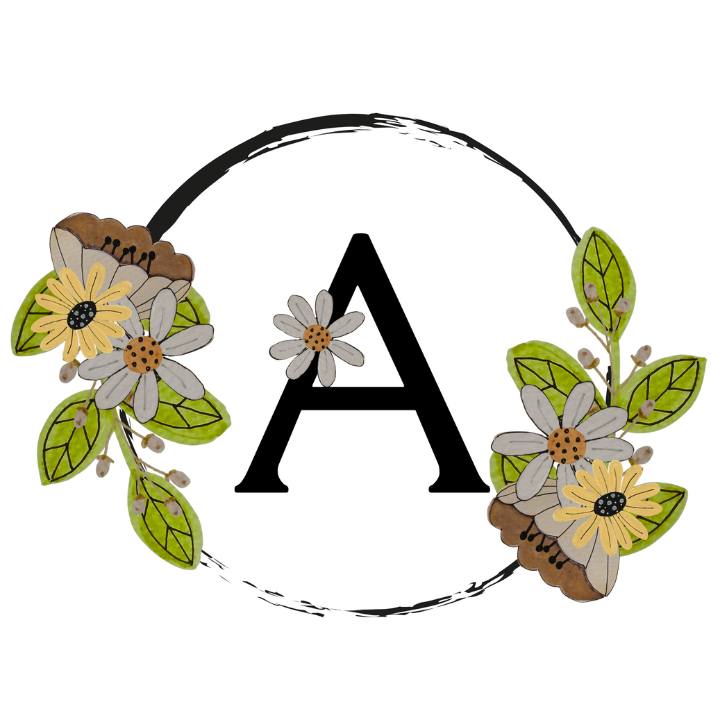 Letter 'A' surrounded by floral decorations on a white background