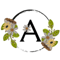 Letter 'A' surrounded by floral decorations on a white background