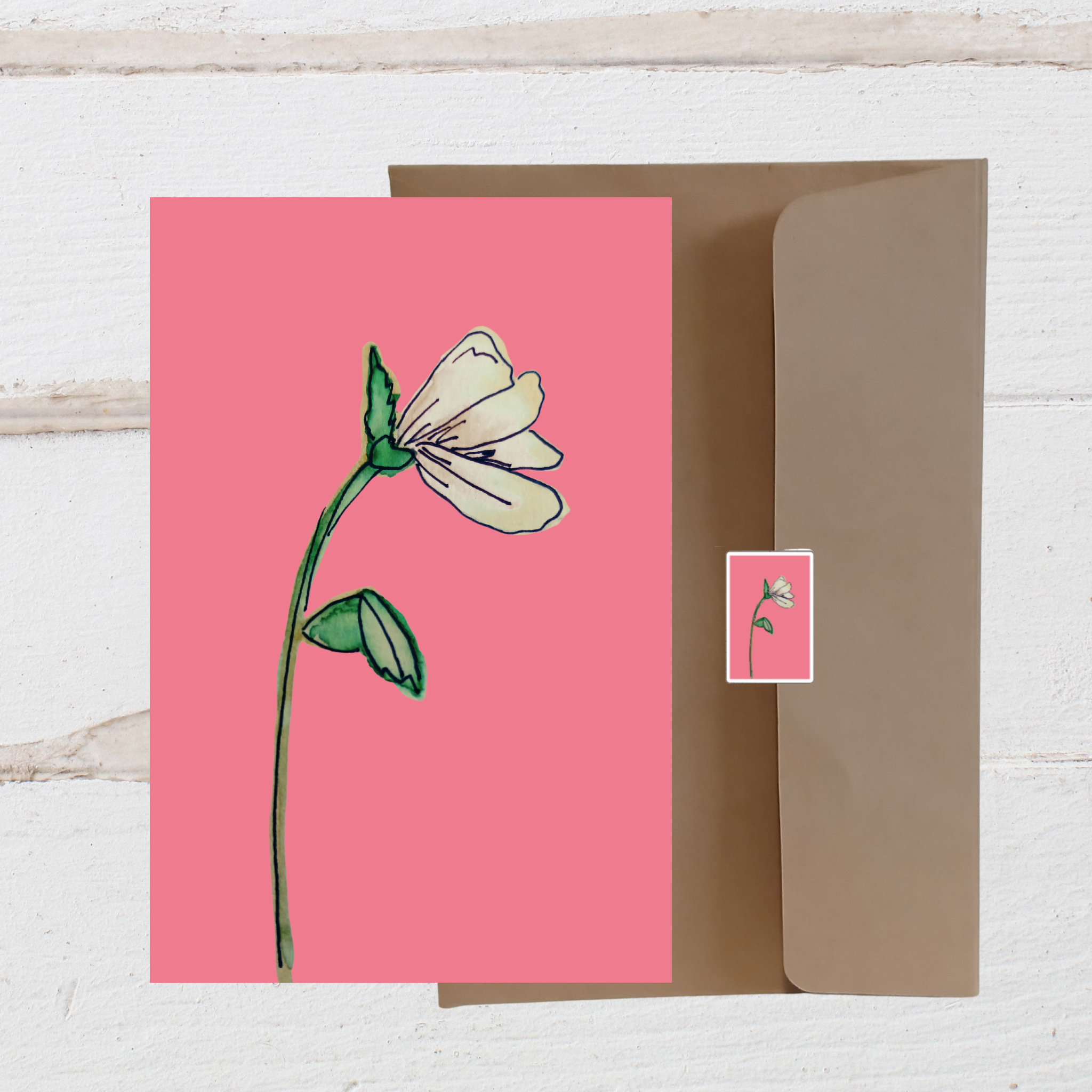 Greeting card with a white flower illustration on a pink background