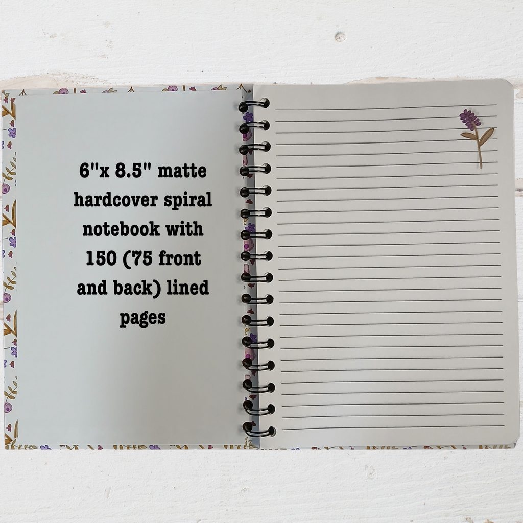 Open notebook with floral design on cover and text 6"x 8.5" notebook 