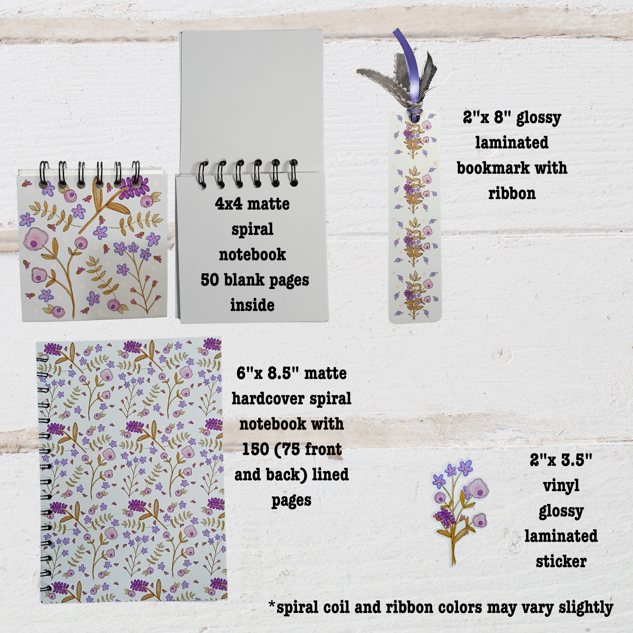 Set of stationery items including  4"x 4" and 6"x 8.5" notebooks and 2"x 8"bookmark with floral designs on a wooden surface.