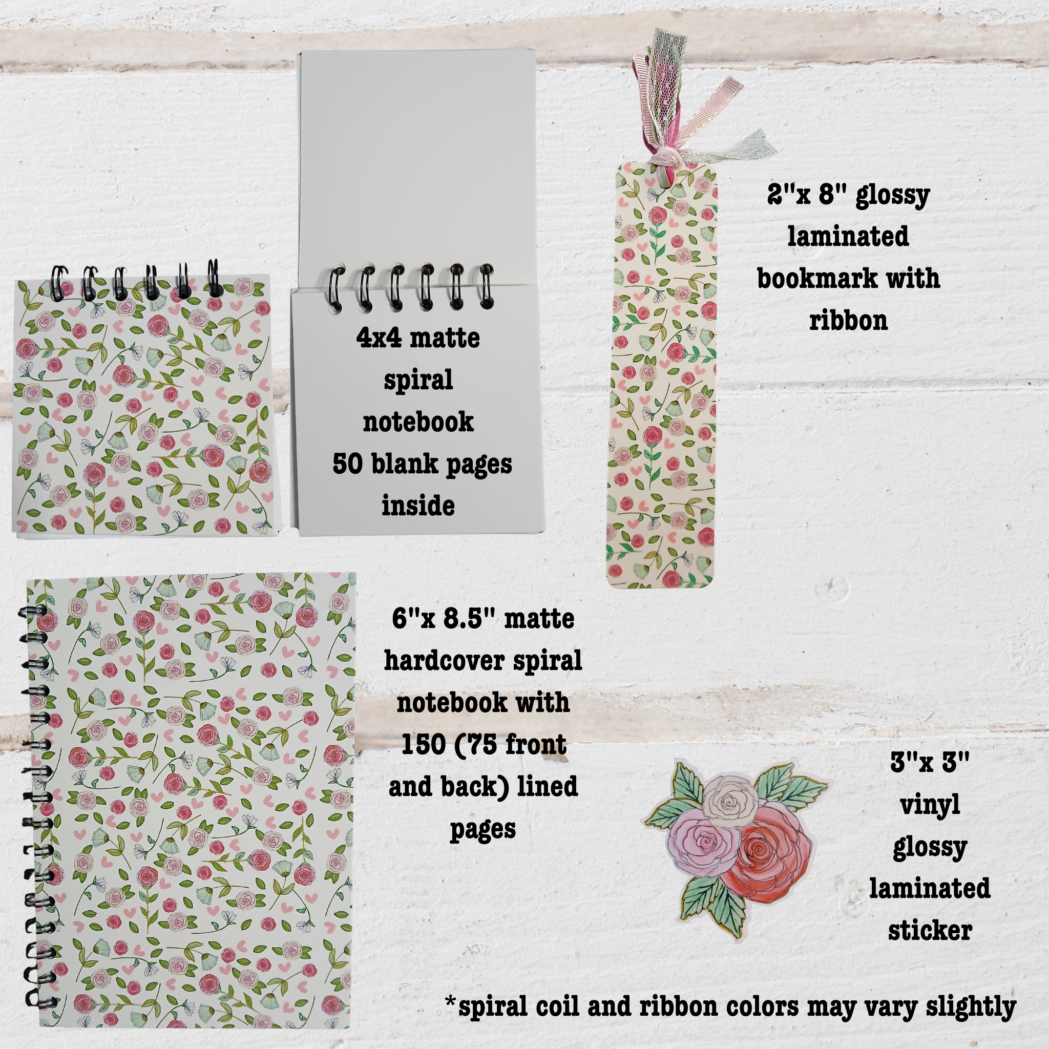 Set of stationery items including  4"x 4" and 6"x 8.5" notebooks and 2"x 8" bookmarks with floral designs on a wooden surface.