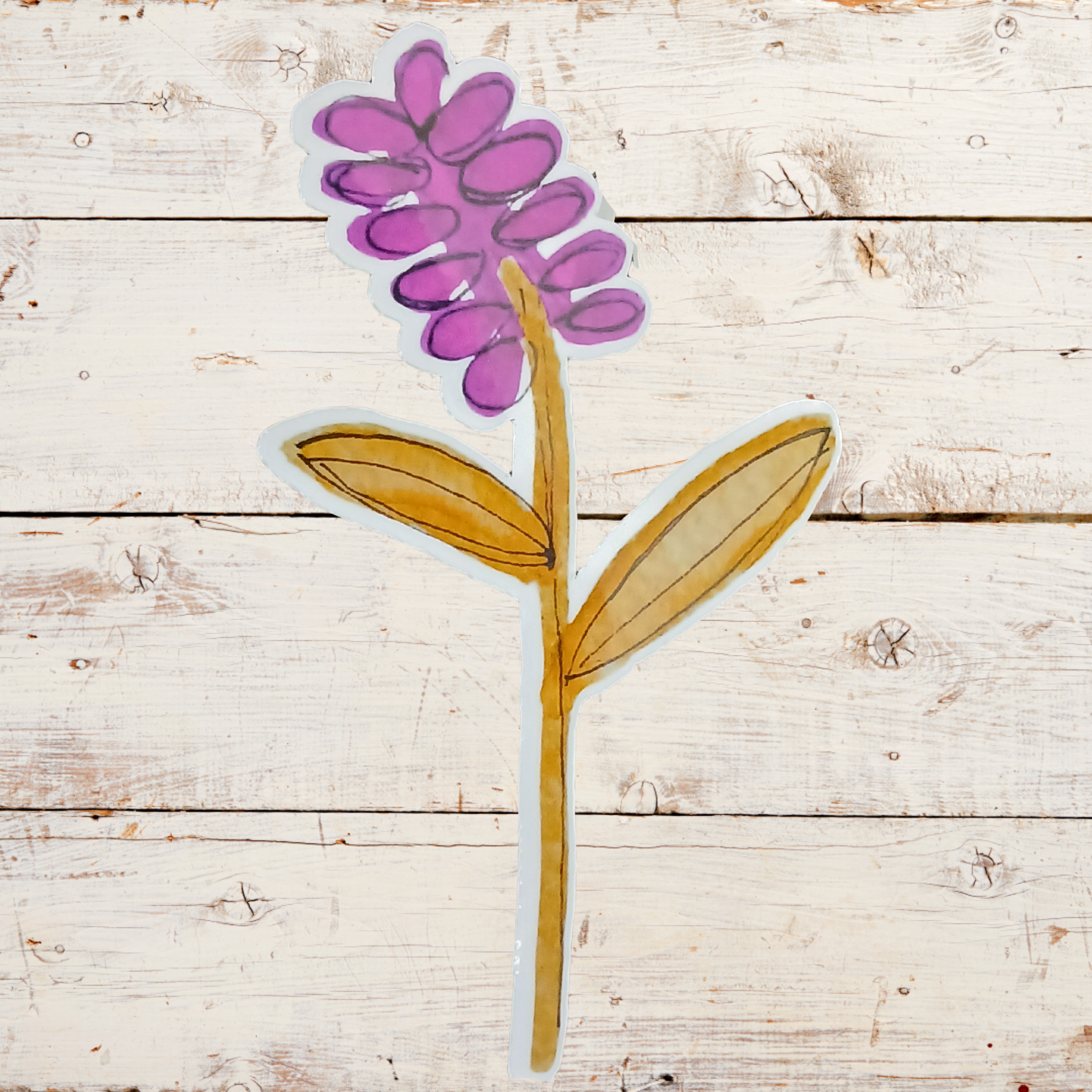 Cartoon-style purple flower with a yellow stem on a wooden surface